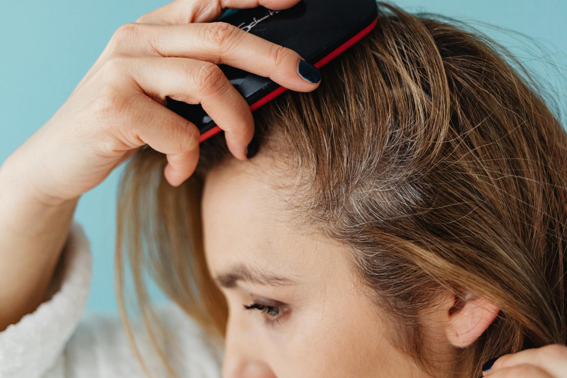 Can You Train Your Scalp to Be Less Oily? Experts Explain